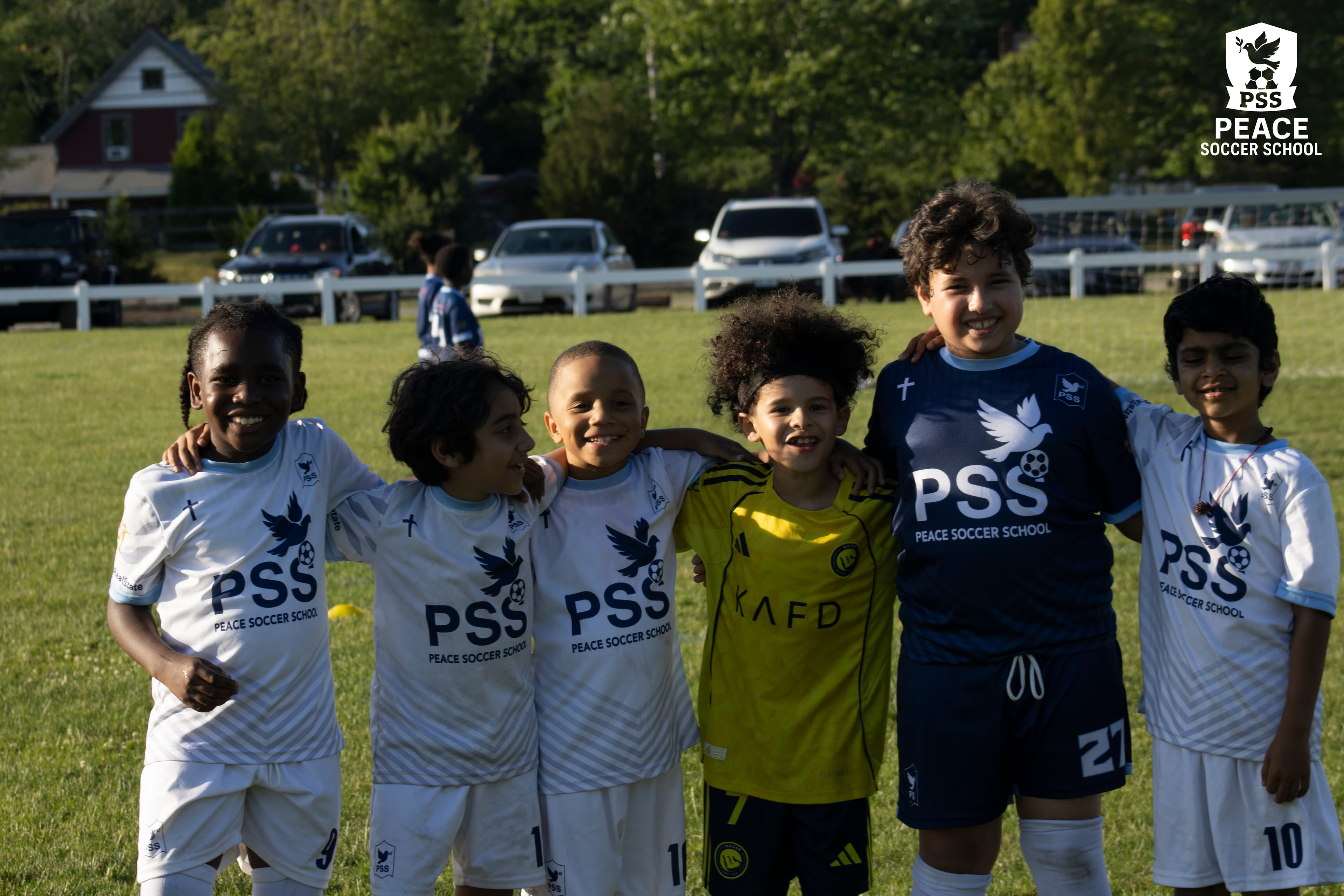 Peace Soccer School players celebrating together